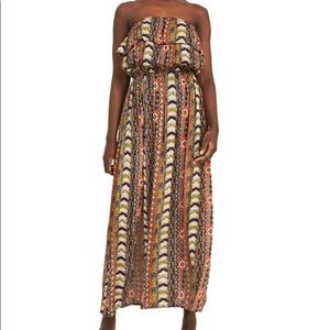 SUZY SHIER Tribal print off the shoulders dress.